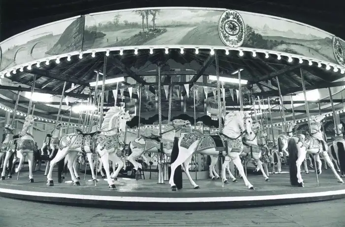 A historic black and white photo of the carousel. 